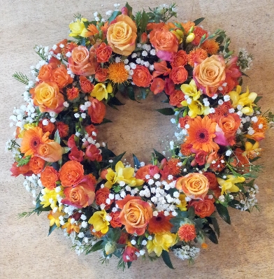 18 inch orange and yellow rose & freesia wreath