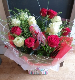 Red Hot Lover 12 long stemmed roses & gypsophelia