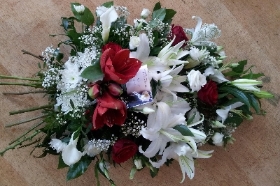 Large white and red lily, rose and gerbera sheaf