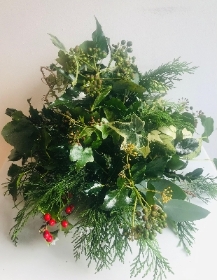 Textured foliage Christmas table posy